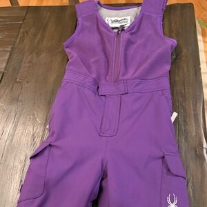Spyder waterproof kids ski pants in purple.